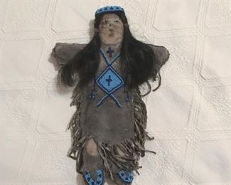 19th c Lakota Sioux Hide Doll with beadwork dress,  headband, and moccasins. 