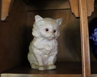 Antique papier-mâché kitten figure with glass eyes
