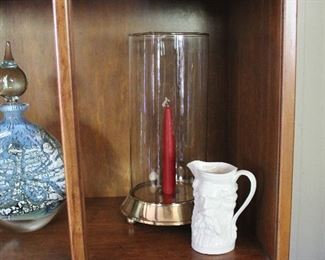 Blown art glass decanter (stopper chipped), brass base hurricane lamp, and a 19th century parian ware pitcher