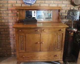 Great paw foot oak sideboard with mirrored back and shelf 44" Long, 20 1/2" deep, 38" tall to top surface, 53" tall to top of mirror back