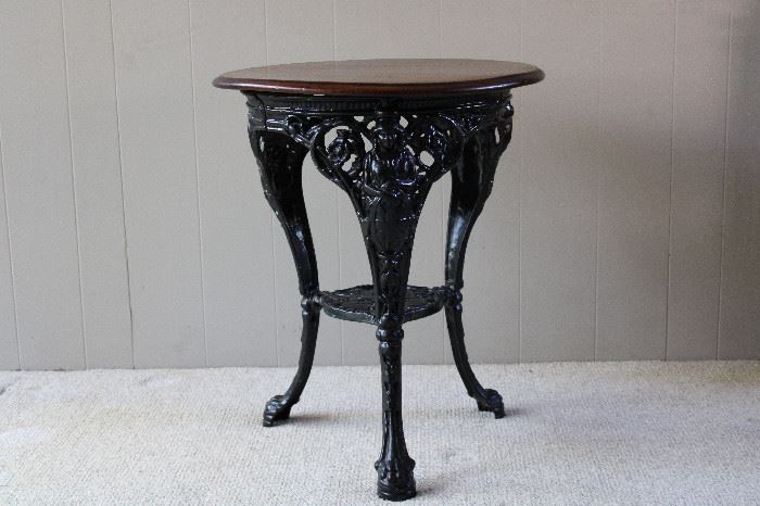 Antique English Pub Table, cast iron base with figural female busts and claw feet.