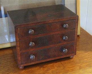19th century miniature three drawer chest on bun feet