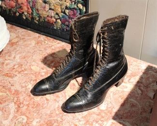 Pair of woman's antique high top boots