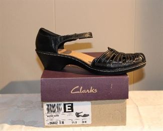 A new pair of Clarks size 8 sandals, New in Box!