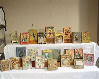 The rather large collection of early L. Frank Baum Wizard of Oz children's books.