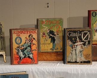 Close ups of RINKITINK IN OZ,  THE MAGIC OF OZ, and Glinda of OZ early edition children's books.