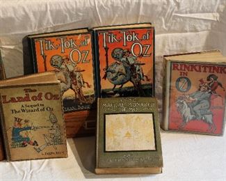 Close ups from the rather large collection of early L. Frank Baum Wizard of Oz children's books, The Land of Oz, TIK-TOK of OZ, RINKITINK IN OZ, and The MAGICAL MONARCH OF MO