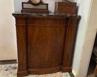 Lovely marble top pier cabinet with one large door