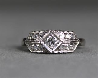 Lovely flashy Deco Revival 14K white gold and diamond ring, approximately 1/3 CTW.  They have great sparkle and are a nice white color to the eye.  Size 6 1/2.