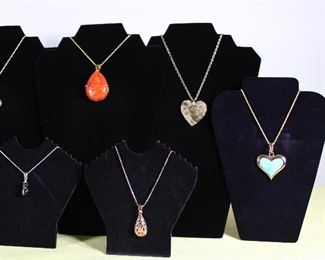 Close ups of the contemporary necklaces and pendants.