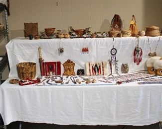 Group shot of Native American basketry, beadwork, mocassins, etc.