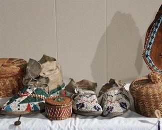 Lovely pair of children's Lakota Sioux beaded moccasins and pine needle baskets