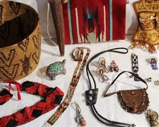 Close up of beaded jewelry, Pima pictorial basket, and sterling silver and turquoise bolo tie