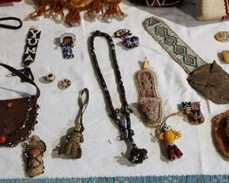 Details of beadwork pieces including a lovely old tobacco pouch in the upper right.
