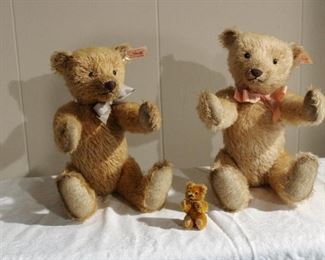Pair of vintage boy and girl Steiff teddy bears and truly miniature unmarked antique teddy bear