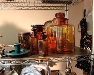 Antique amber glass medicine bottles and apothecary jars
