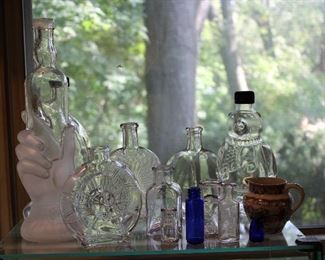 Antique bottles!  Note the antique hand holding the bottle on the left!