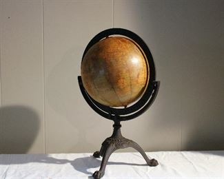 Antique 8" globe by Weber Costello on cast iron base
