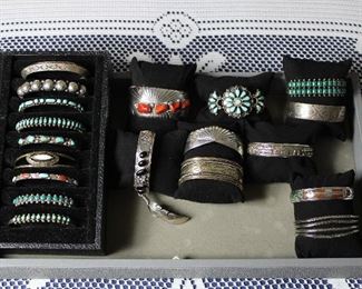 Fantabulous amount of Native American silver cuff bracelets with turquoise, coral, and hand stamped designs!