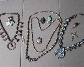 Native American silver and turquoise pendants, bead necklaces, and squash blossom necklaces
