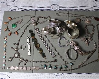 Vintage and antiques sterling silver bracelets, cuffs, and necklaces, including enamel, malachite, and pearls and turquoise.