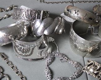 Wide sterling silver cuff bracelets, including a mid century modern design signed ROHNER