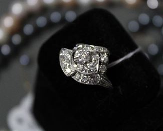 Diamond and 14K white gold cocktail ring, c. 1950's. A mix of Old European Cut diamonds, 16 in total with at least 1.30 CTW