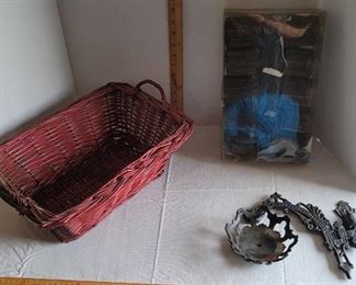 Wicker basket, cast iron candle stick holder & tiki lights