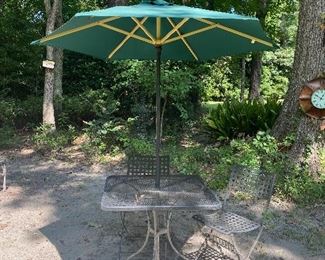 30” x 30” Wrought Iron Table with (2) Chairs and Umbrella
$195