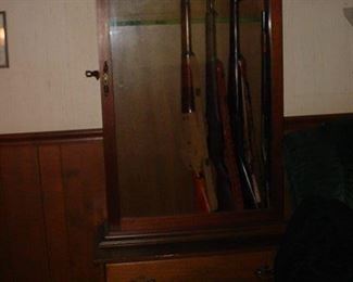 Beautiful gun cabinet...over 15 rifles, shotguns and pistols