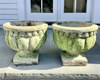 A Pair Of Cast Stone Urns
Lot #: 34