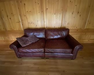 Walter E Smithe red leather couch barely used and purchased less than three years ago (about 2019)