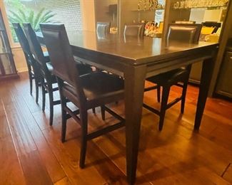 2) $1,295 Robb & Stuckey high top dining table with 6 leather stools  Black birch  • 36 high 96 wide 42 deep 
removable leaf • 24
Six leather dining chairs  • 43high 21wide 22deep