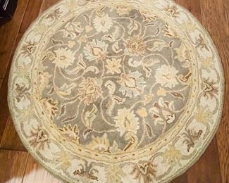 21)   $90    SURYA round rug Caesar collection 4' x 4' - 100% wool made in India • 47 across