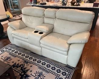 23b)   $425    Cream "Stone" manual recliner (south end of room) just a bit more wear on head rest. Otherwise very good condition.  • 40high 39deep 85wide