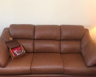Gorgeous leather sofa and loveseat from The Leather Factory.