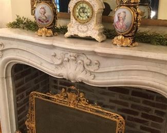 closer view of the Old Paris vases featuring Marie  Antoinette and her mother Empress Maria Theresa.  Notice the fine fire screen , the French Trumeau mirror, and the fine old porcelain clock