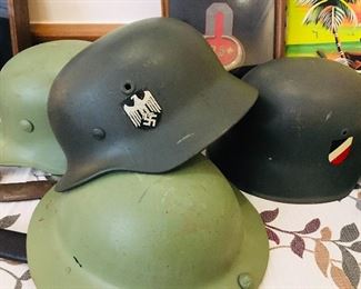 Military items---including 4 WW1 and WW 2 style helmets