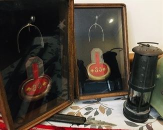 a pair of framed early Prussian epaulets and stirrups,  plus a 1930's brass Coal Miner's Lantern