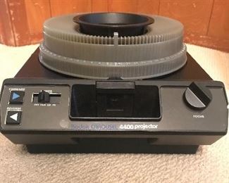 Mint condition slide projector with box and instruction manual. 