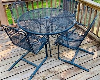 Cast Iron Patio Table & 4 Rocker Chairs 