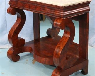 46 - Flamed mahogany Empire pier table with scroll column front and white marble top, attrib. to Meeks in mint condition, 36 in. T, 42 in. W, 20 in. D.