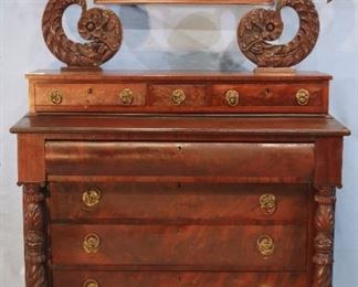 49 - Mahogany Empire dresser with acanthus carved front with dolphin support on mirror, claw feet and brass pulls, 73 in. T, 45 in. W, 22 in. D.