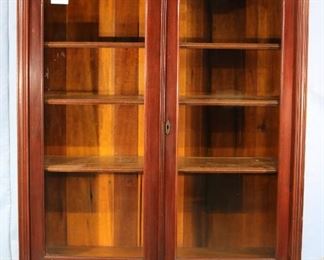 53A - Walnut Victorian 2 door bookcase with carving and burl accents, 64 in. T, 47 in. W, 15 in. D.