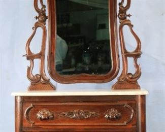67A - Rosewood rococo marble top dresser with  swivel mirror and carved wood pulls, in great condition, 95 in. T, 43 in. W, 20 in. D.