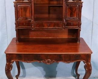 90 - Walnut Victorian rococo writing desk with pierce carved gallery, 65 in. T, 44.5 in. W, 36 in. D.