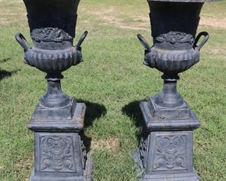 365 - Pair of cast iron garden urns on base, with  handles, 41 in. T, 19 in. W.