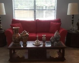 Red 2 cushion couch with 2 matching pillows.  Ricardo Lynn & company Teak coffee table + 2 octagon side tables.  Tables have green marble inlay top