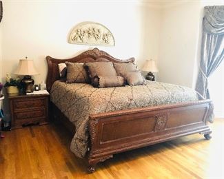 Carved wood King sleigh bed