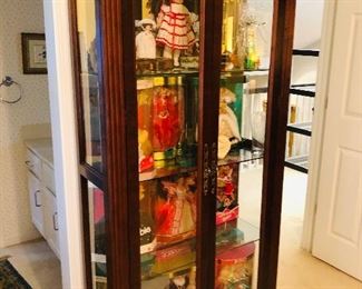 Collection of Limited Edition Barbies in Boxes and glass front display cabinet